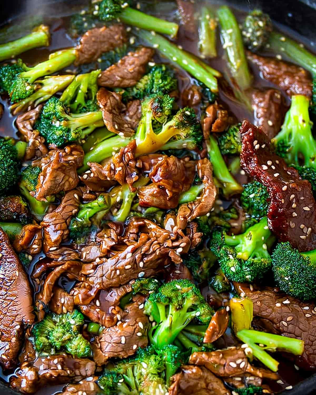 Beef and broccoli meal prep with tender sliced beef, crisp broccoli florets in savory brown sauce.