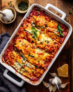 Zucchini lasagna meal prep baked with layers of tender zucchini, rich tomato sauce, and melted cheese.